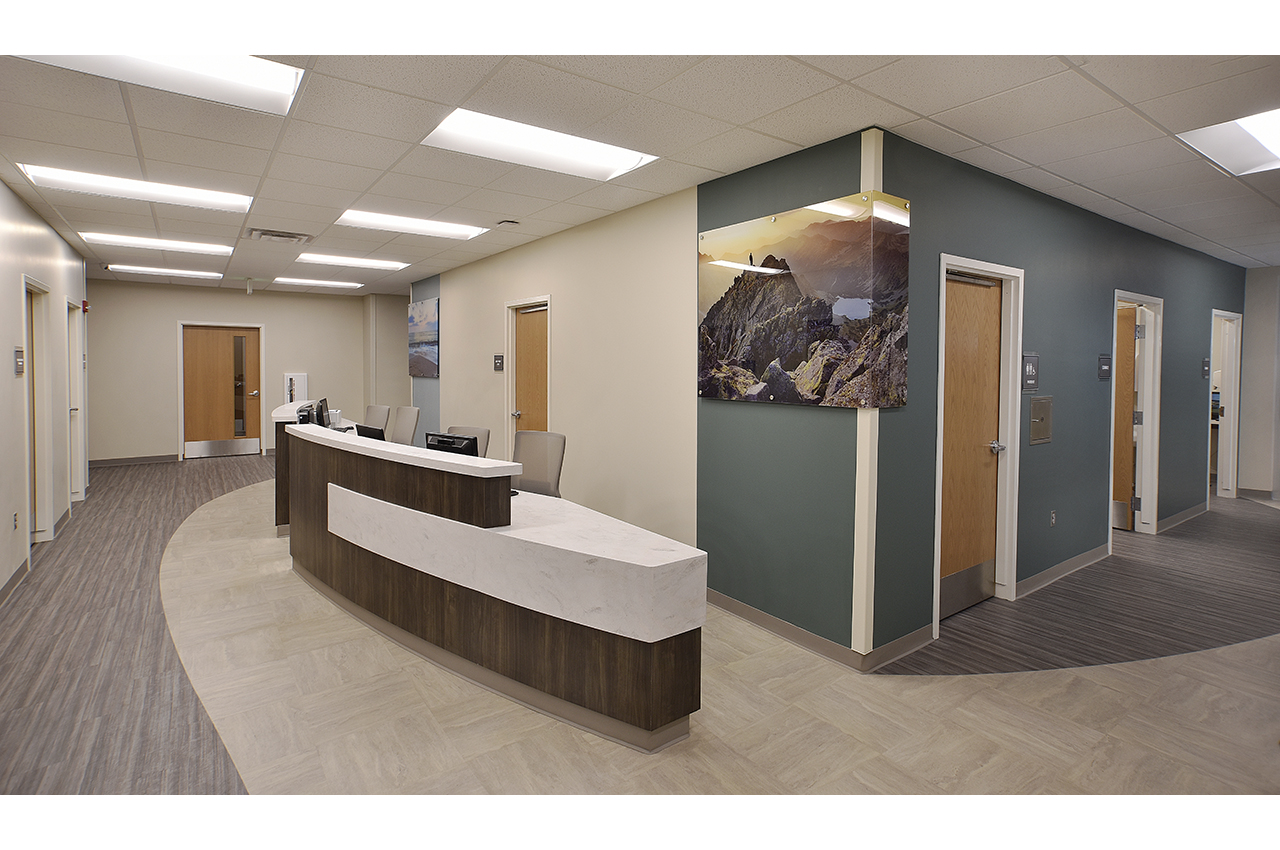 total healthcare nurse station at russell medical center which provides colorful wayfinding via photography